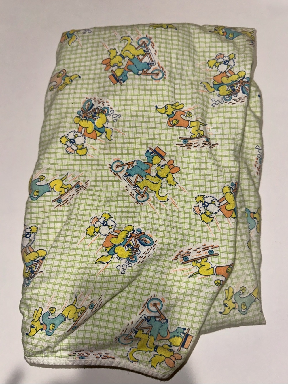 Vintage Cartoon Dog riding bikes Print Toddler/kids fitted sheet 37”x58”